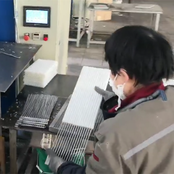 insert spine into battery tubular plate